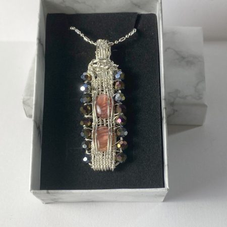 Unique wire-wrapped pendant with abalone shell and crystals