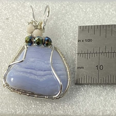 Beautiful blue lace agate wrapped in silver plated wire with bead detail