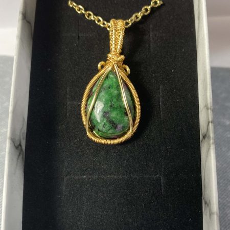 Gorgeous small ruby in zoisite wire-wrapped pendant