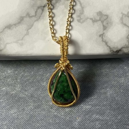Gorgeous small ruby in zoisite wire-wrapped pendant