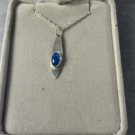 Delicate sterling silver pendant with stunning neon apatite