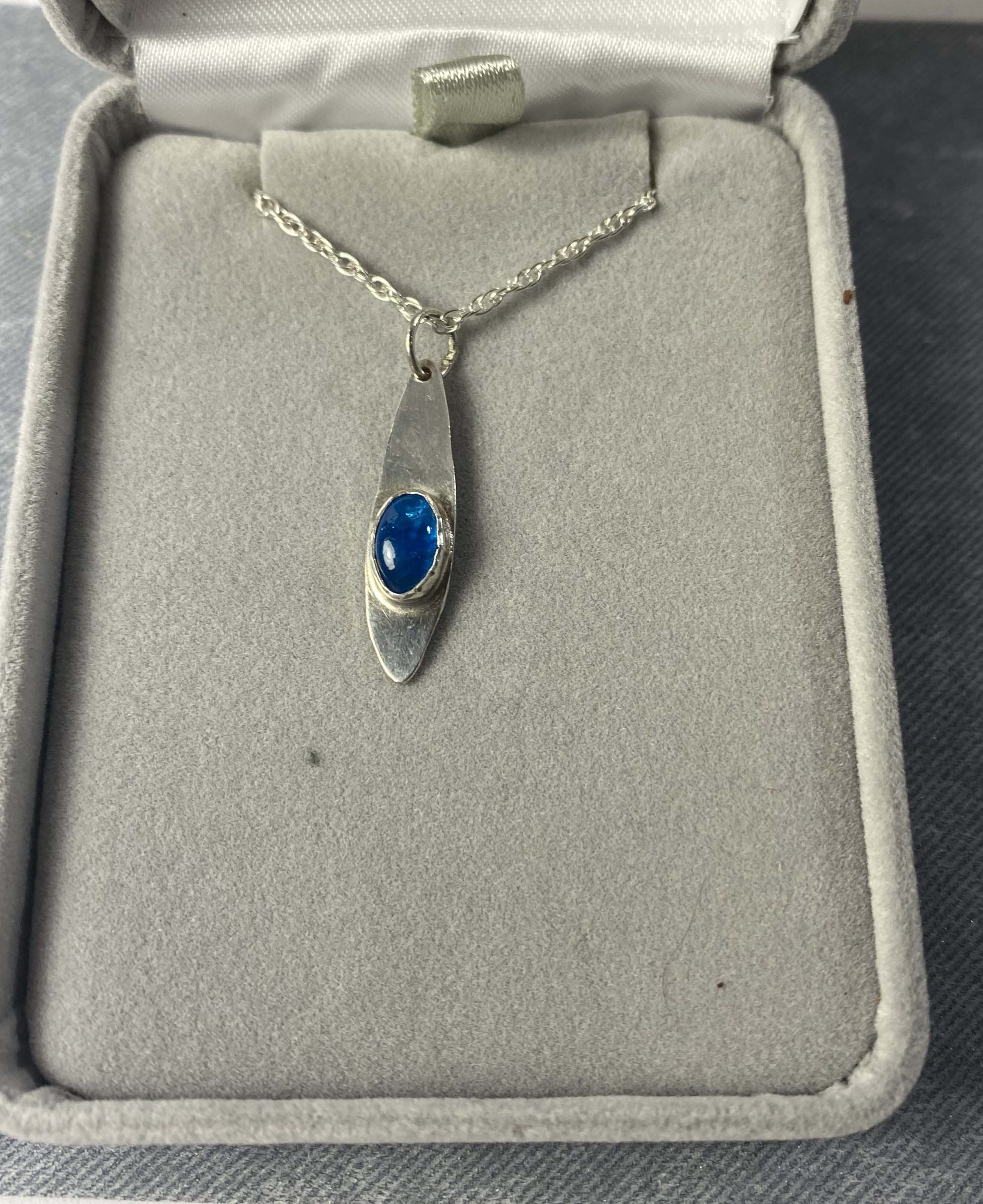 Delicate sterling silver pendant with stunning neon apatite