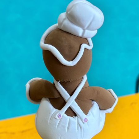Gingie Chef Wearing a Pinny with Rolling Pin