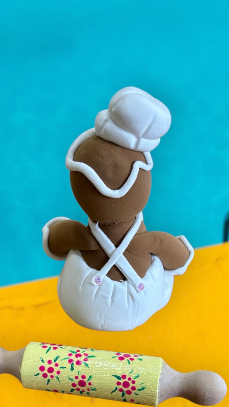 Gingie Chef Wearing a Pinny with Rolling Pin