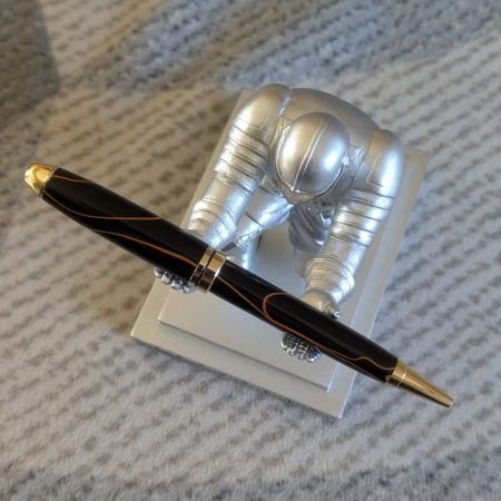 Euro twist acrylic ballpoint pen in black with burnt orange coloured lines