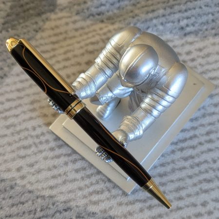 Euro twist acrylic ballpoint pen in black with burnt orange coloured lines