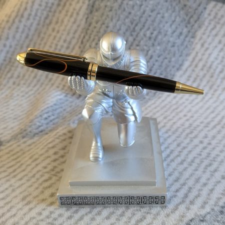 Euro twist acrylic ballpoint pen in black with burnt orange coloured lines