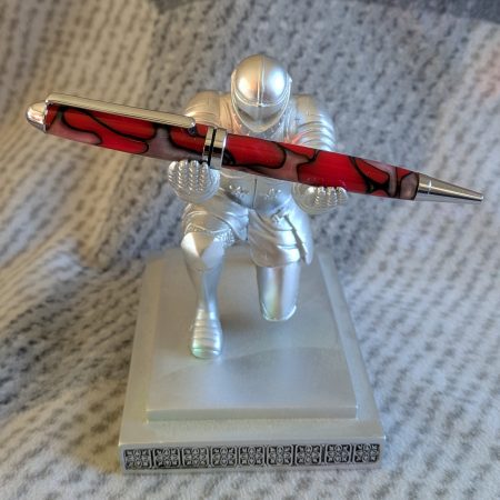 Euro twist ballpoint pen made from red acrylic with pearled coloured swirls