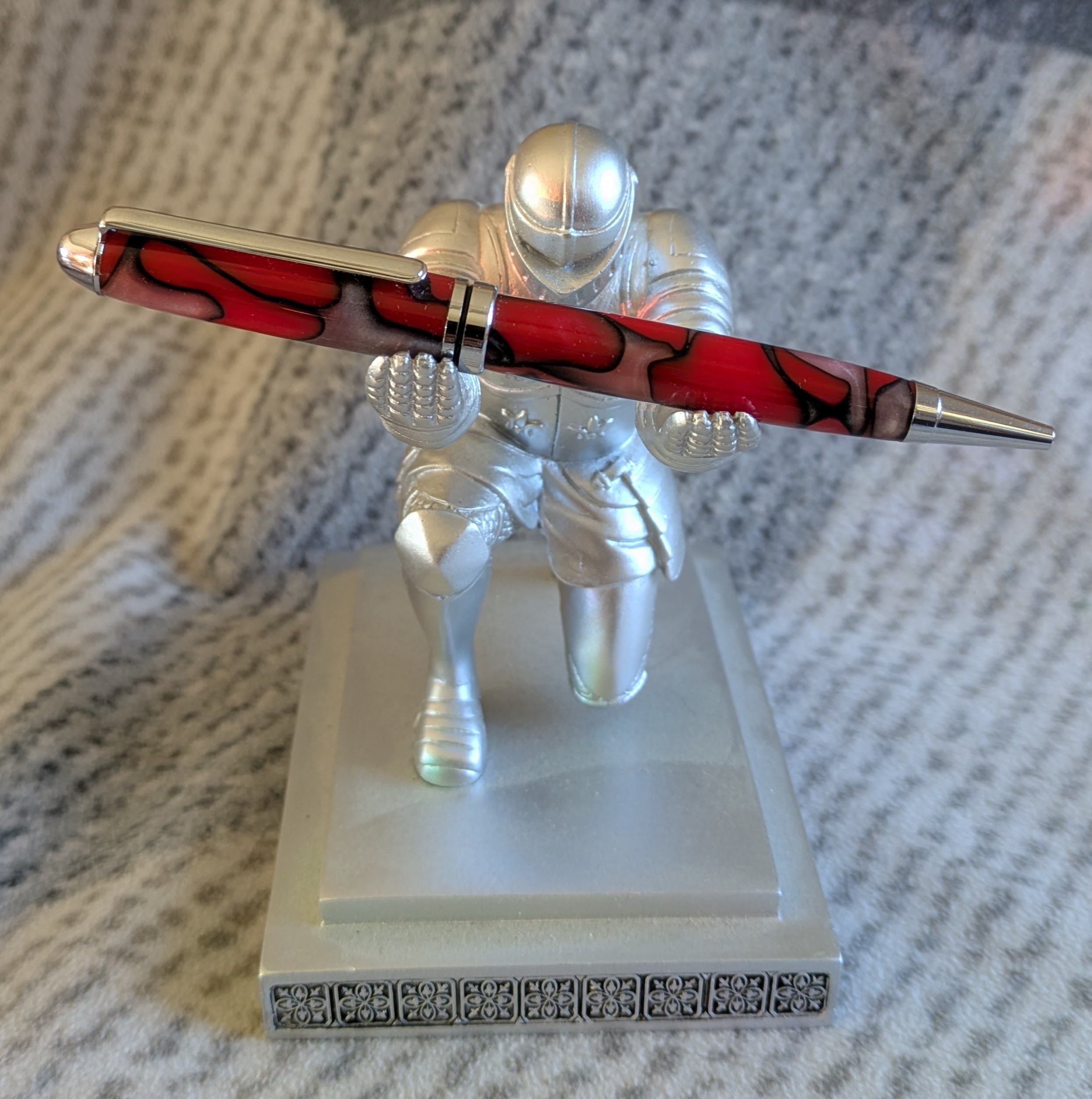 Euro twist ballpoint pen made from red acrylic with pearled coloured swirls