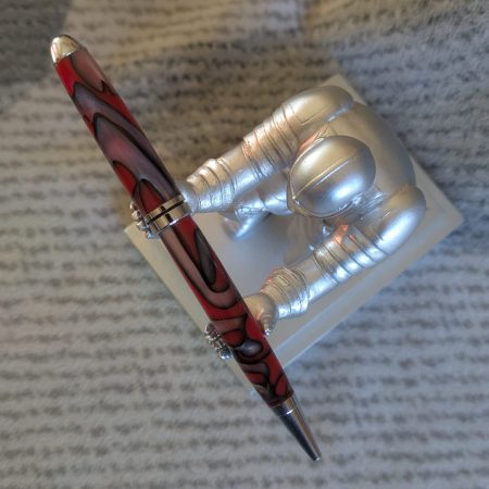 Euro twist ballpoint pen made from red acrylic with pearled coloured swirls