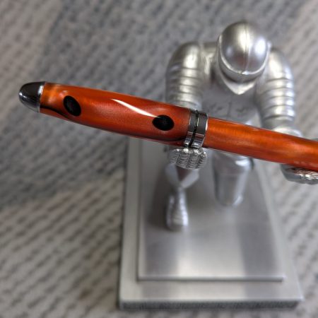 Euro twist ballpoint pen in orange acrylic with black lines and chrome fittings
