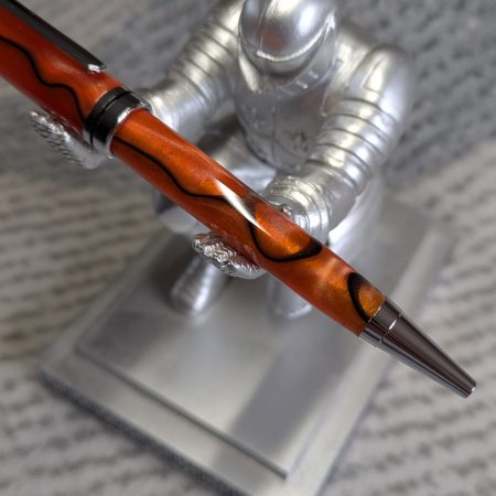 Euro twist ballpoint pen in orange acrylic with black lines and chrome fittings