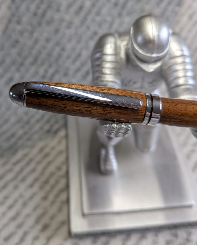 Euro twist wooden ballpoint pen made from walnut with shiny chrome fittings