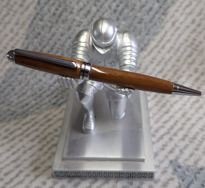 Euro twist wooden ballpoint pen made from walnut with shiny chrome fittings