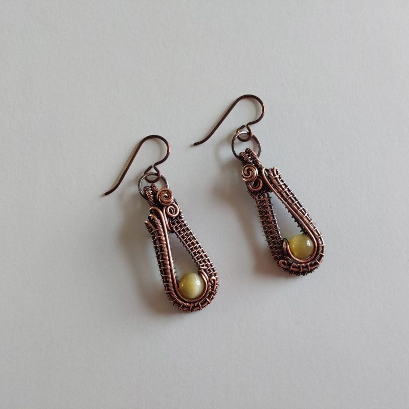 Handmade wire weave Cats Eye earrings in copper.