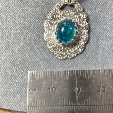 Stunning sterling silver pendant set with beautiful neon apatite
