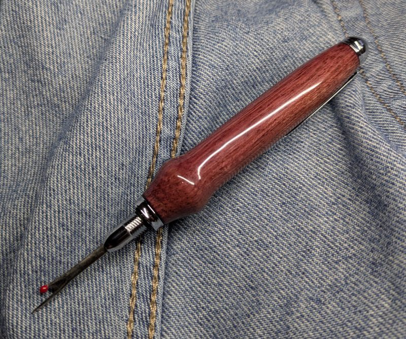 Seam ripper-unpicker made from purple heart with chrome fittings
