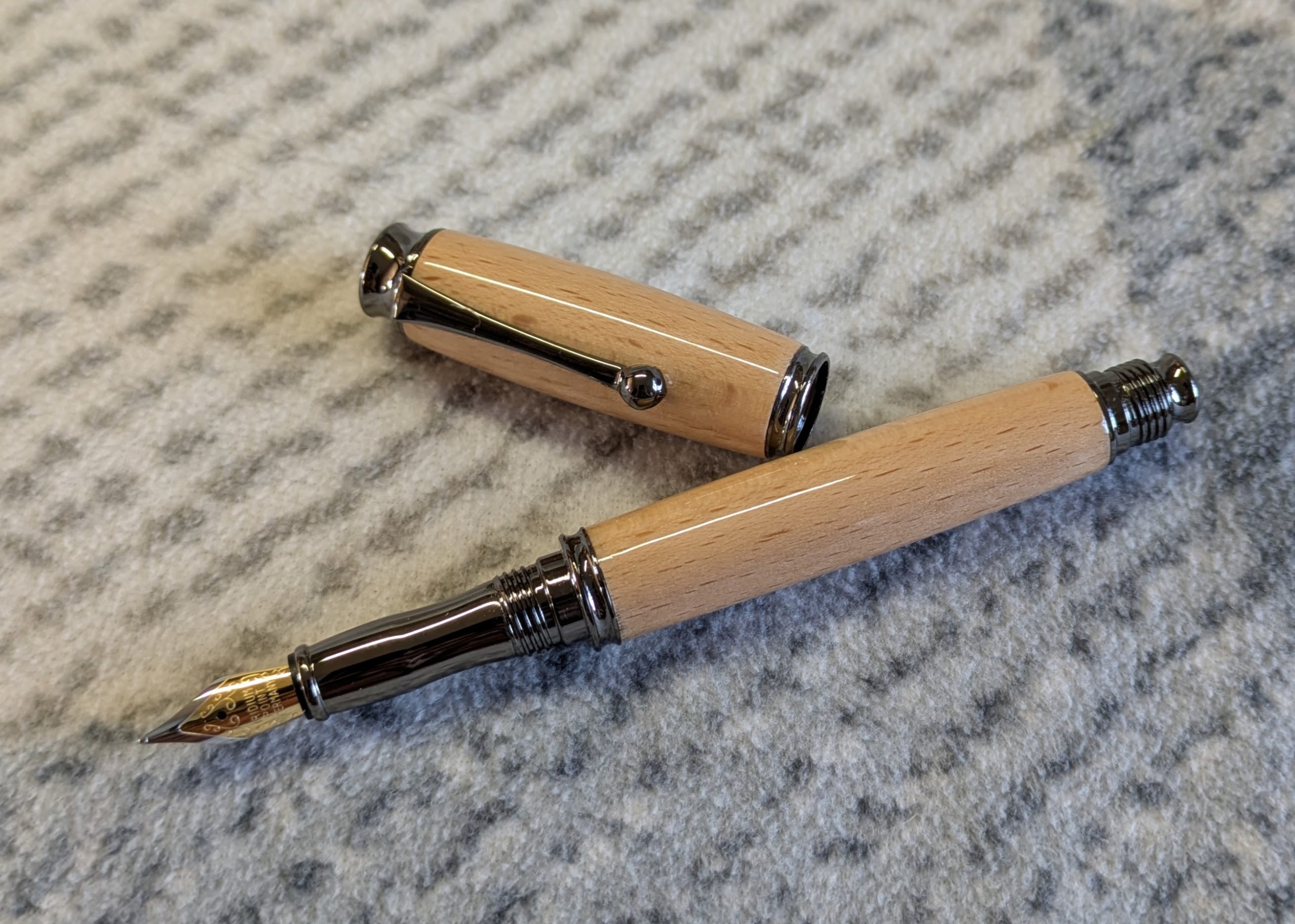 Wooden Omega-style fountain Pen Made from beech wood, with gun metal fittings