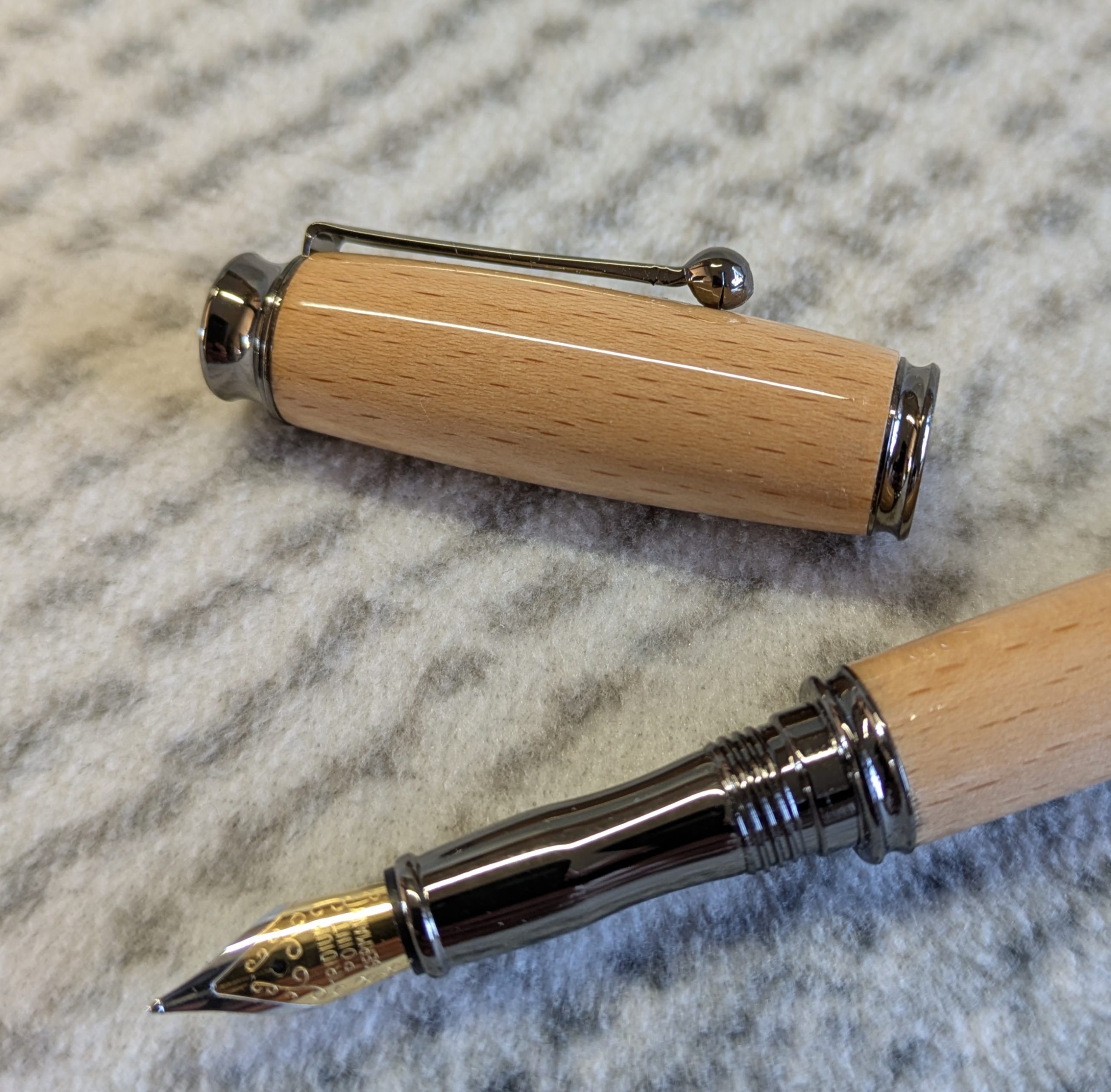 Wooden Omega-style fountain Pen Made from beech wood, with gun metal fittings