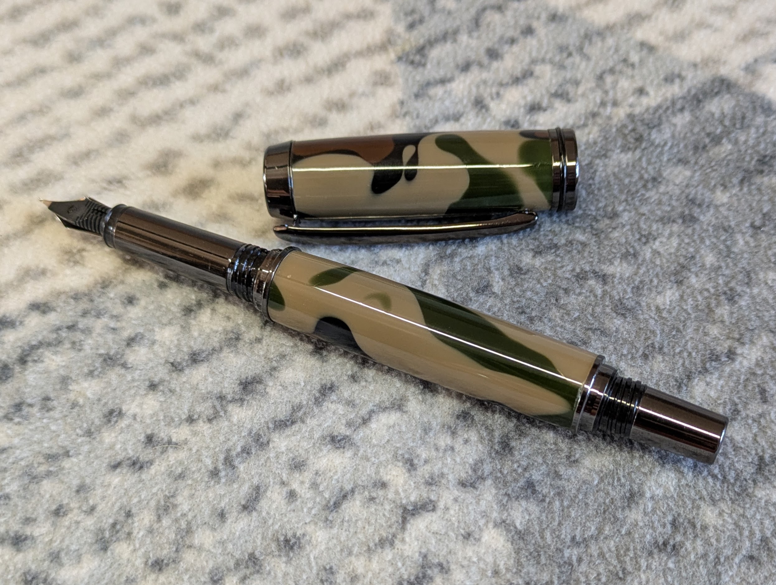 Acrylic Jr Gentleman-style fountain pen made from camouflage coloured acrylic with gun metal fitting