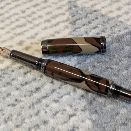 Acrylic Jr Gentleman-style fountain pen made from camouflage coloured acrylic with gun metal fitting