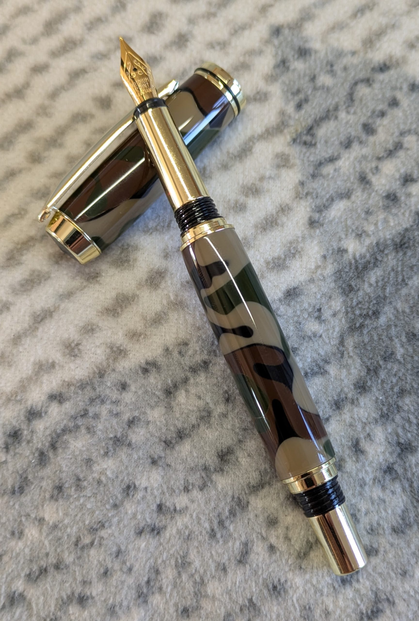 Acrylic Jr Gentleman-style fountain pen made from camouflage coloured acrylic with gold fittings