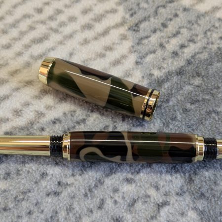 Acrylic Jr Gentleman-style fountain pen made from camouflage coloured acrylic with gold fittings