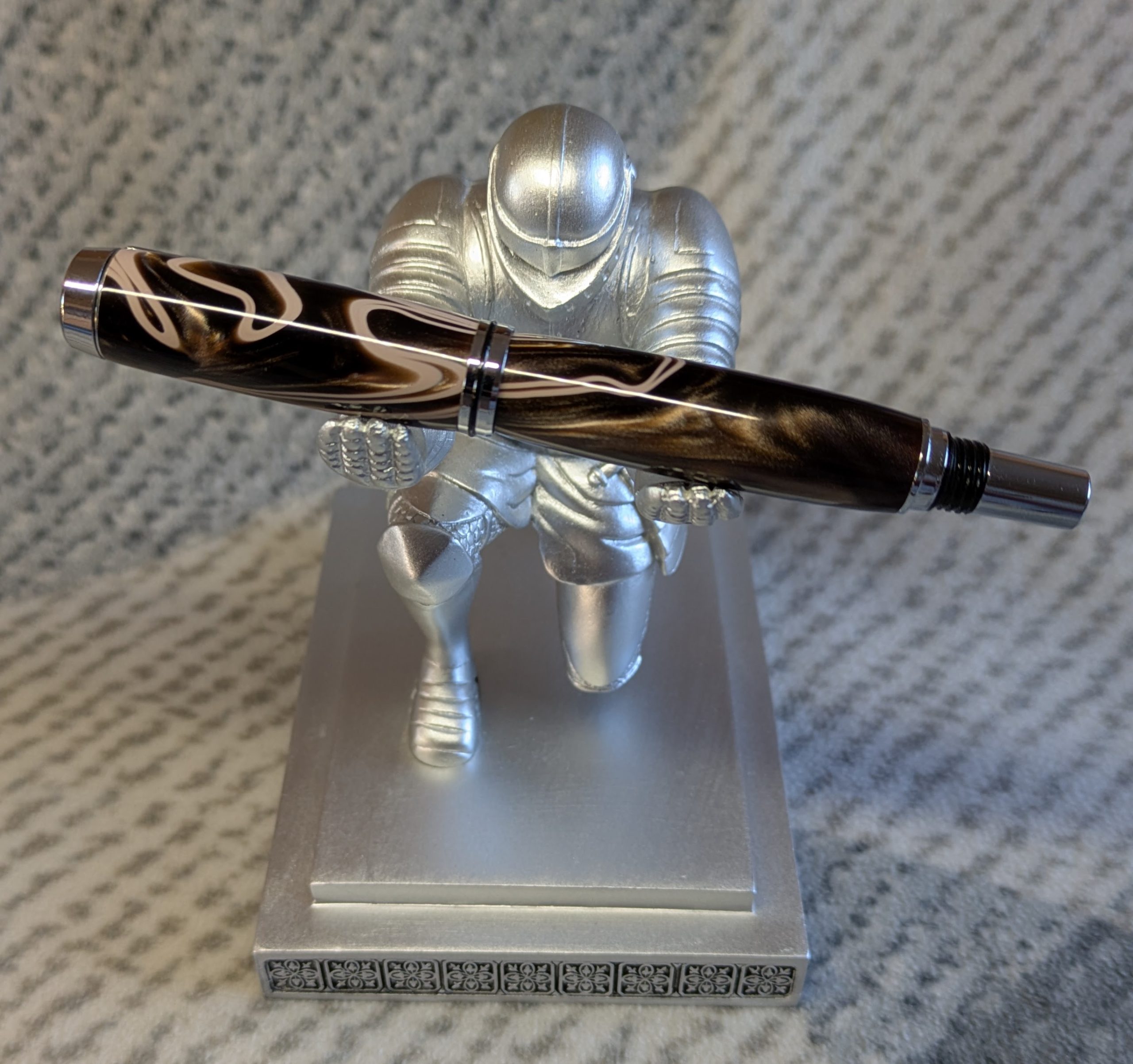 Jr Gentleman-style rollerball pen made from shimmering brown coloured acrylic with chrome fittings