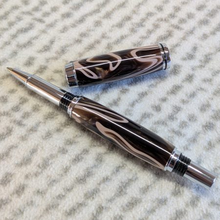 Jr Gentleman-style rollerball pen made from shimmering brown coloured acrylic with chrome fittings