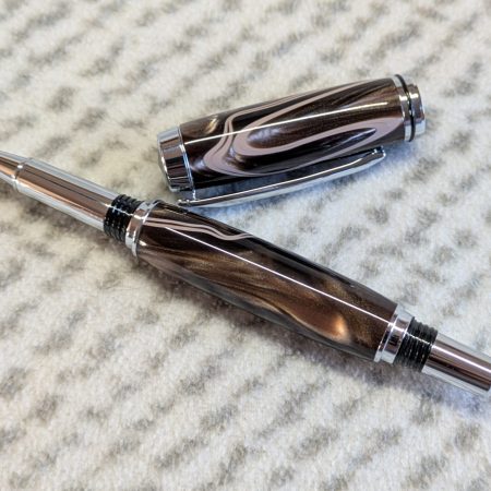Jr Gentleman-style rollerball pen made from shimmering brown coloured acrylic with chrome fittings