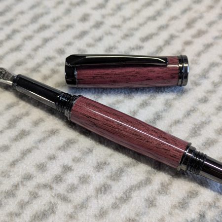 Hand turned Jr-Gentlemen style fountain pen made in Purple heart wood with gun metal fittings