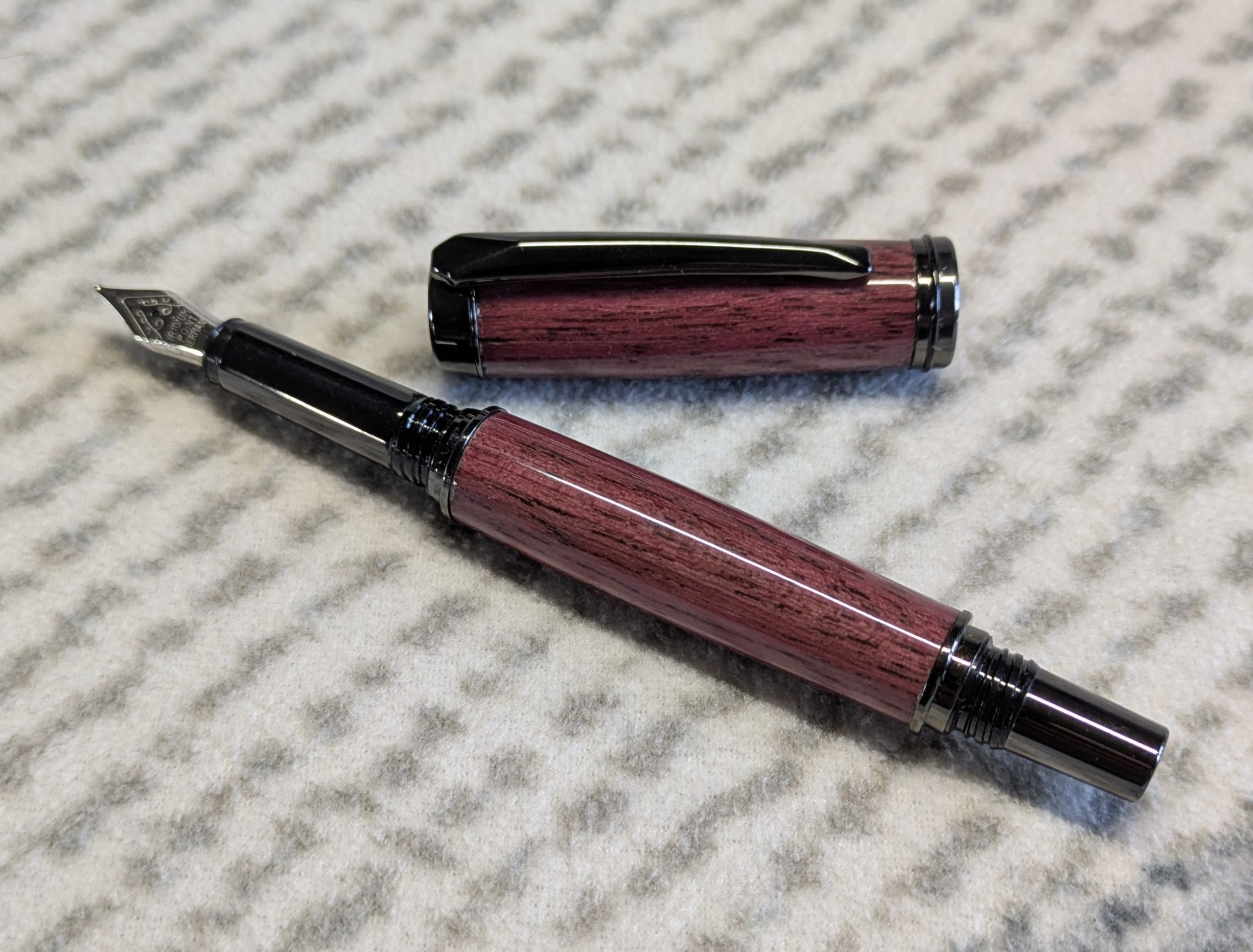 Hand turned Jr-Gentlemen style fountain pen made in Purple heart wood with gun metal fittings