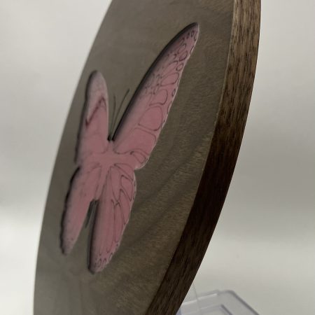 Gorgeous Circular Walnut Veneer Engraved with a Butterfly, filled with pink Resin