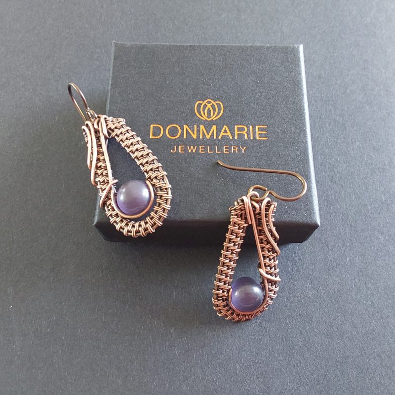 Dangly wire weave earrings with amethyst beads.