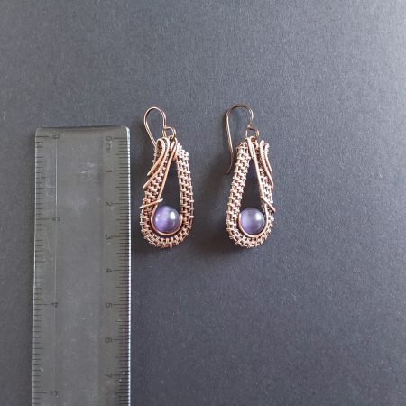 Dangly wire weave earrings with amethyst beads.