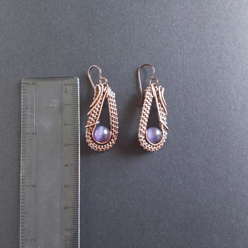 Dangly wire weave earrings with amethyst beads.