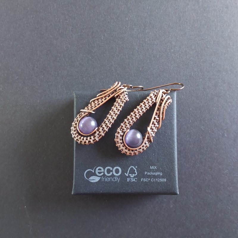 Dangly wire weave earrings with amethyst beads.