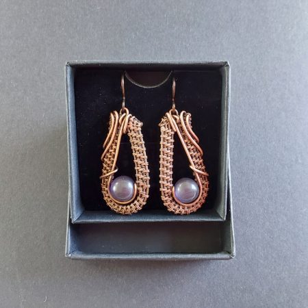 Dangly wire weave earrings with amethyst beads.