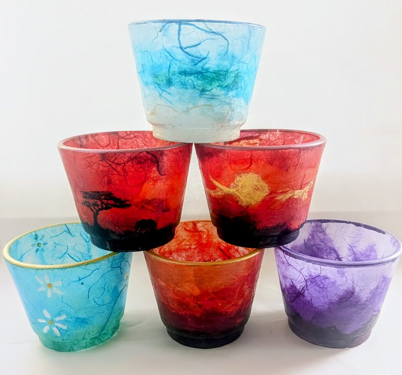 Tea light candle holders. Unique, hand decorated glow pots. Various colours and designs available.