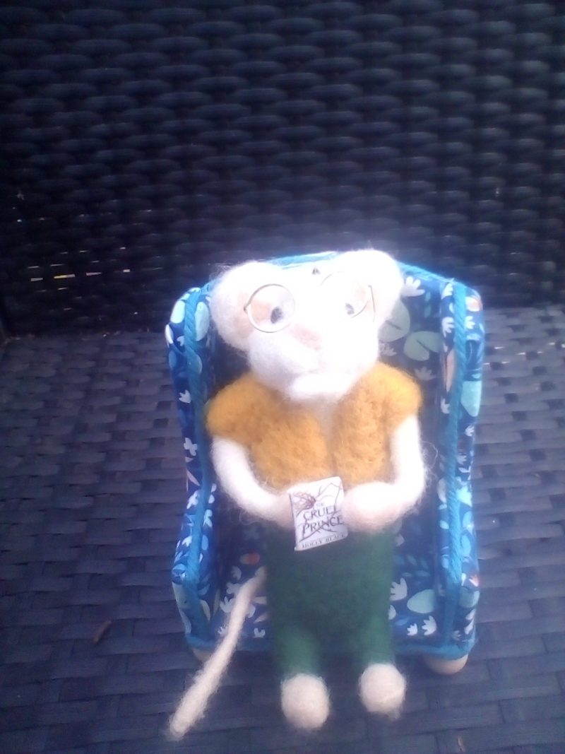 needle felted mouse relaxing in his chair