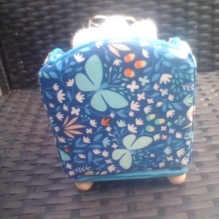 needle felted mouse relaxing in his chair