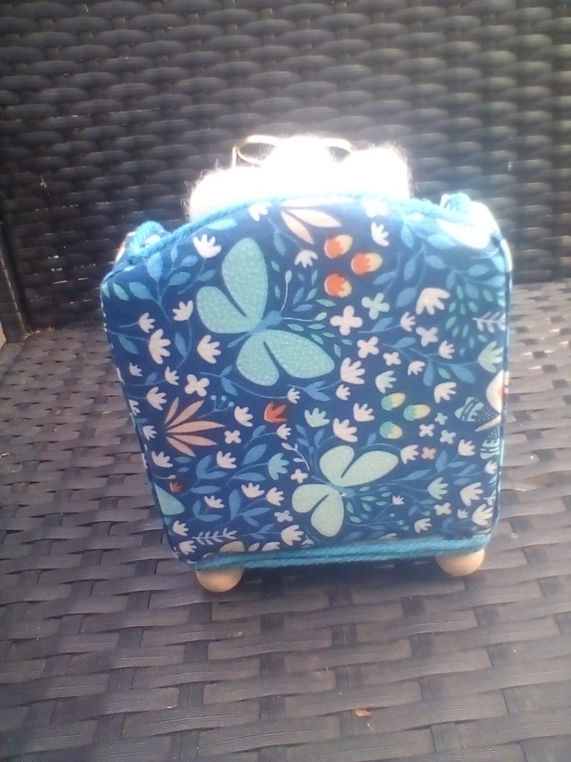 needle felted mouse relaxing in his chair
