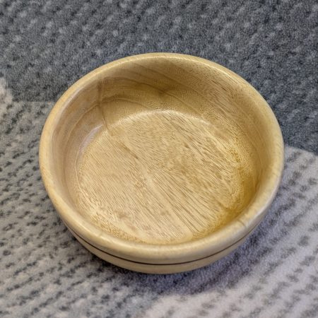 Small wood bowl made from Idigbo with an accent ring