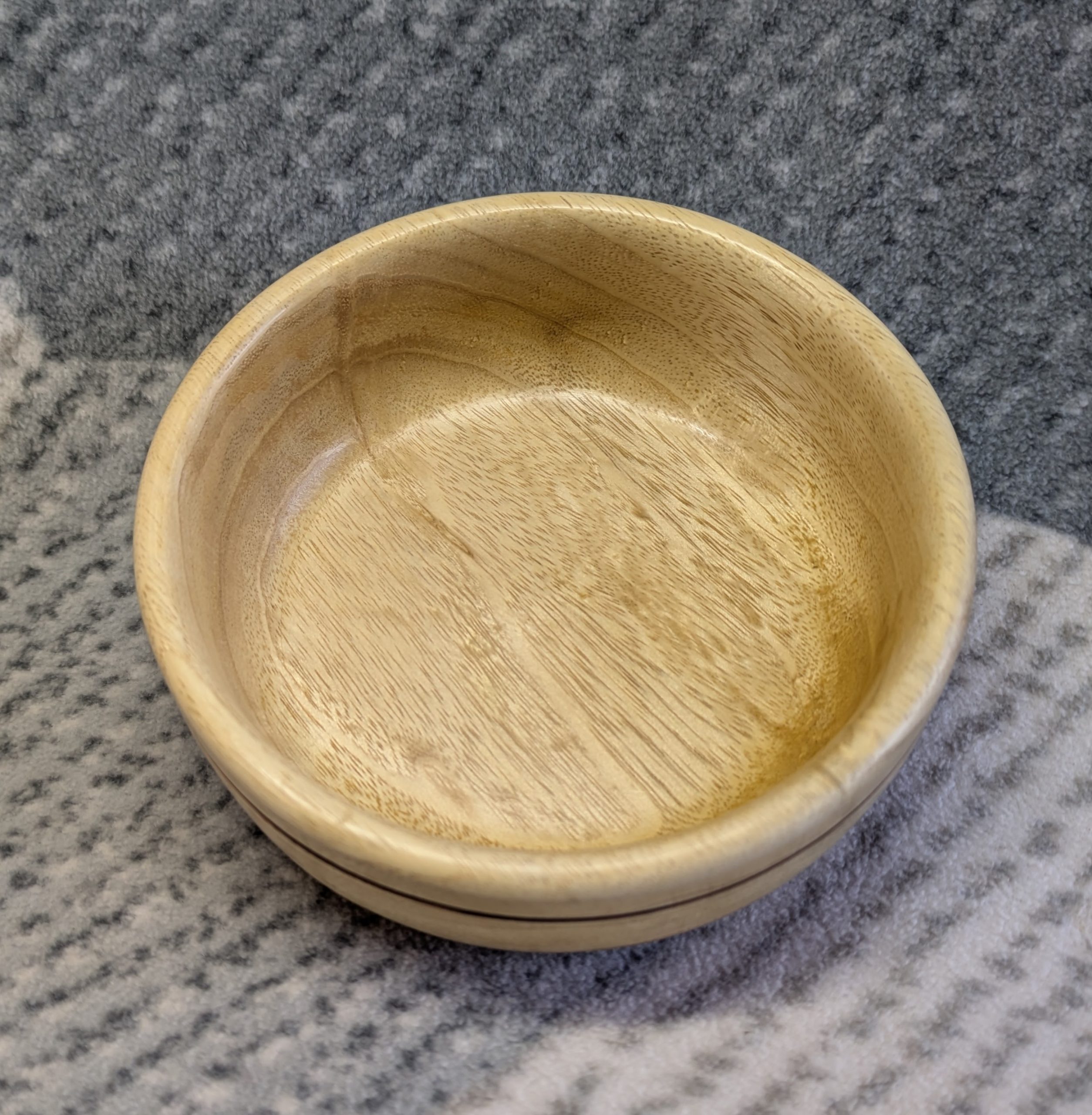 Small wood bowl made from Idigbo with an accent ring