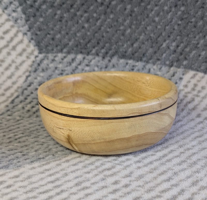 Small wood bowl made from Idigbo with an accent ring
