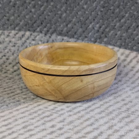 Small wood bowl made from Idigbo with an accent ring