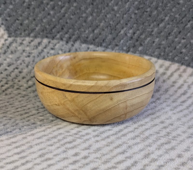 Small wood bowl made from Idigbo with an accent ring
