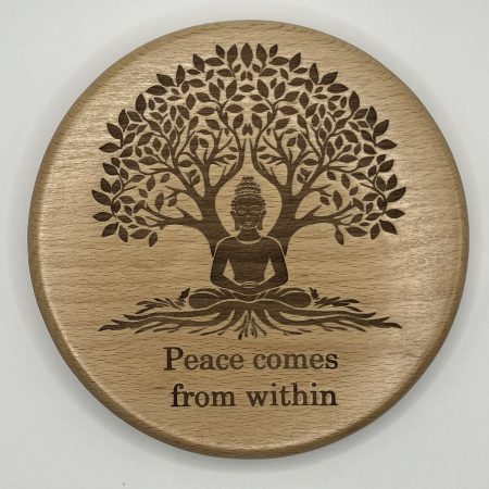Buddha Engraved on Beech sitting under tree with words 'Peace Comes From Within'