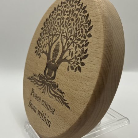Buddha Engraved on Beech sitting under tree with words 'Peace Comes From Within'