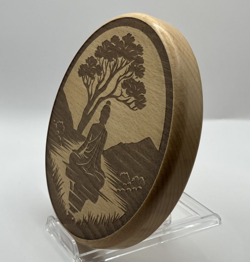 Peaceful Engraved Buddha silhouette under tree on Circular Beech